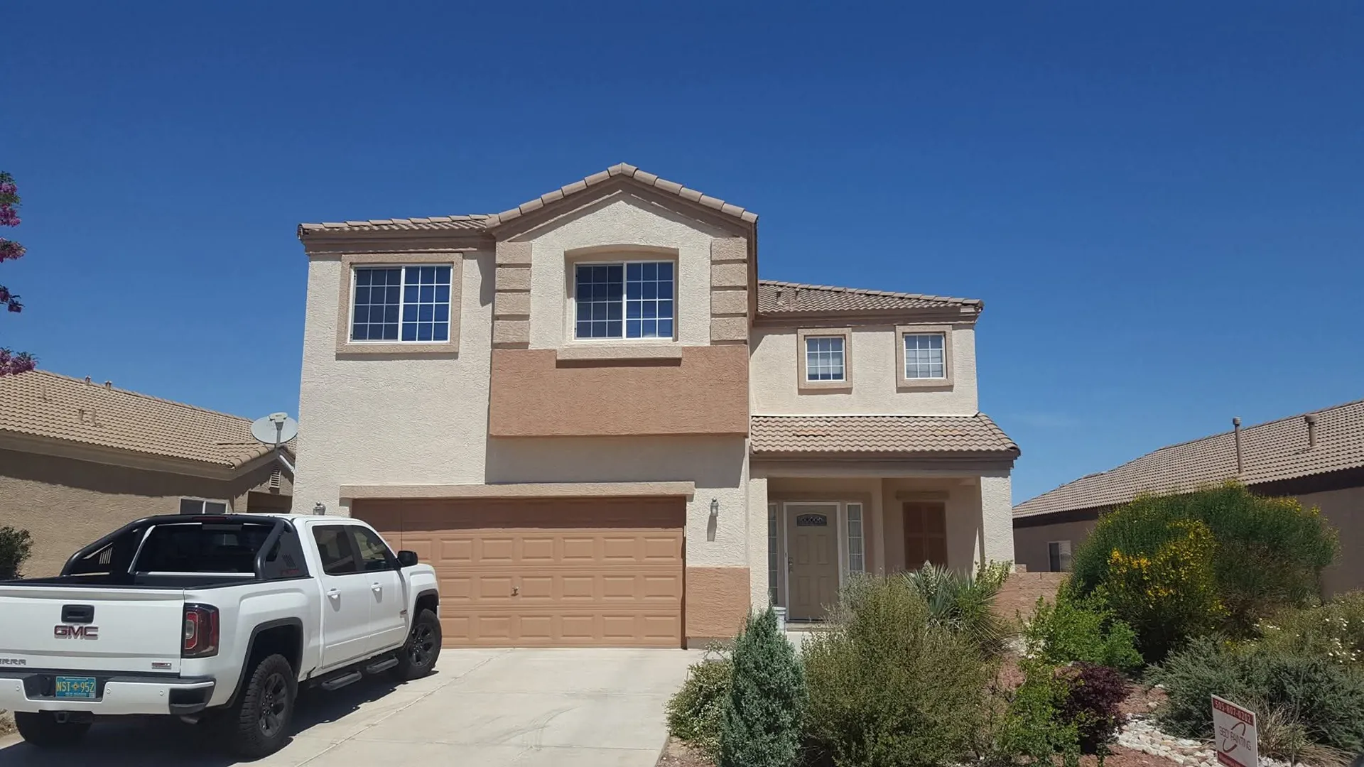 Freshly painted home exterior after A Quality Handyman service in Albuquerque, NM