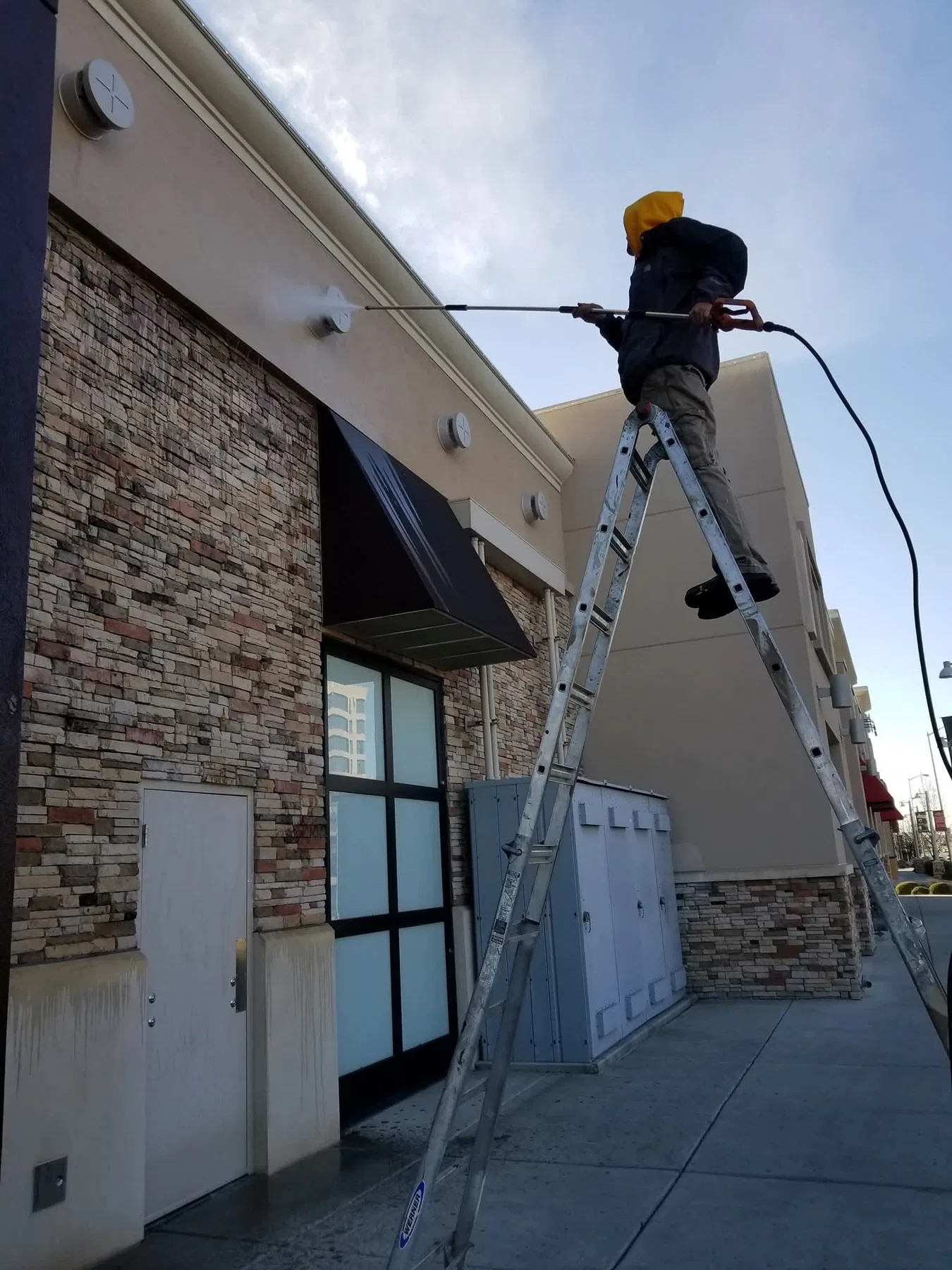 Commercial storefront repainted by A Quality Handyman