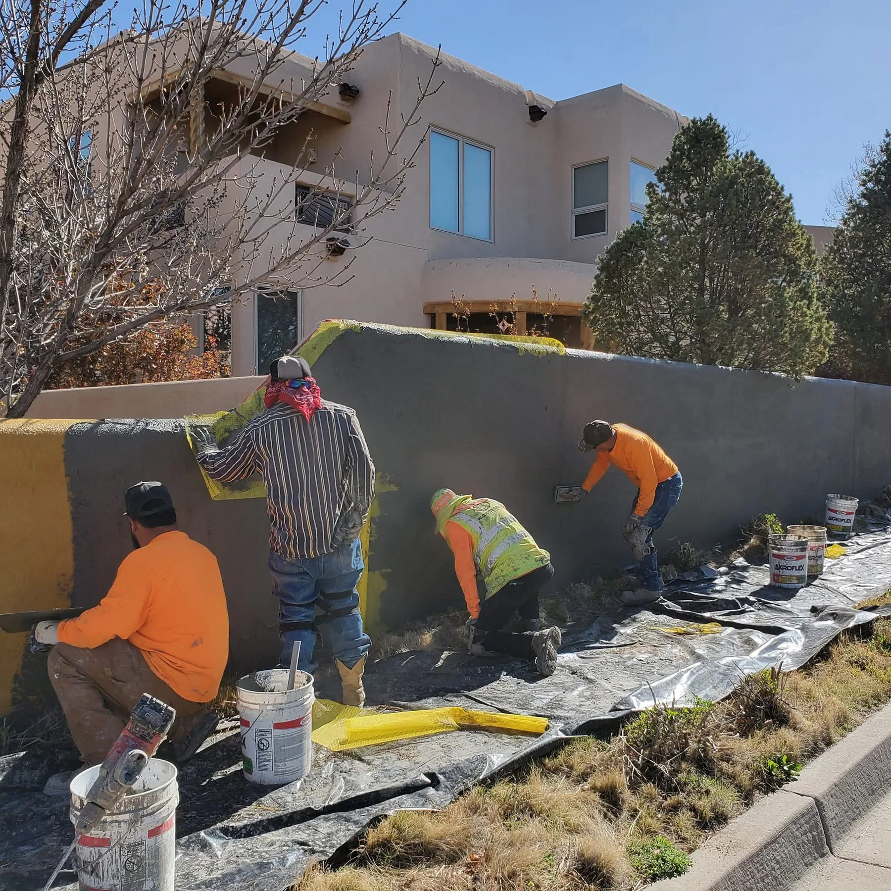 Fresh exterior paint on a Southwest-style home