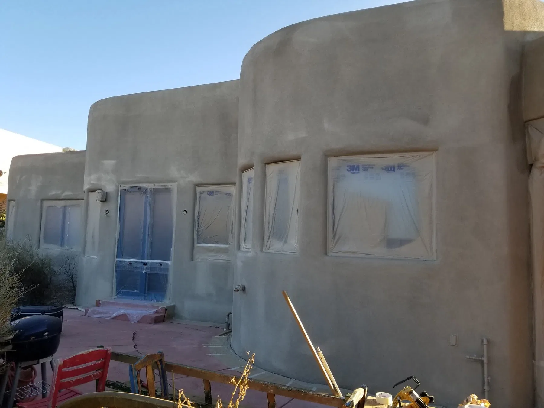 Restored adobe-style stucco exterior