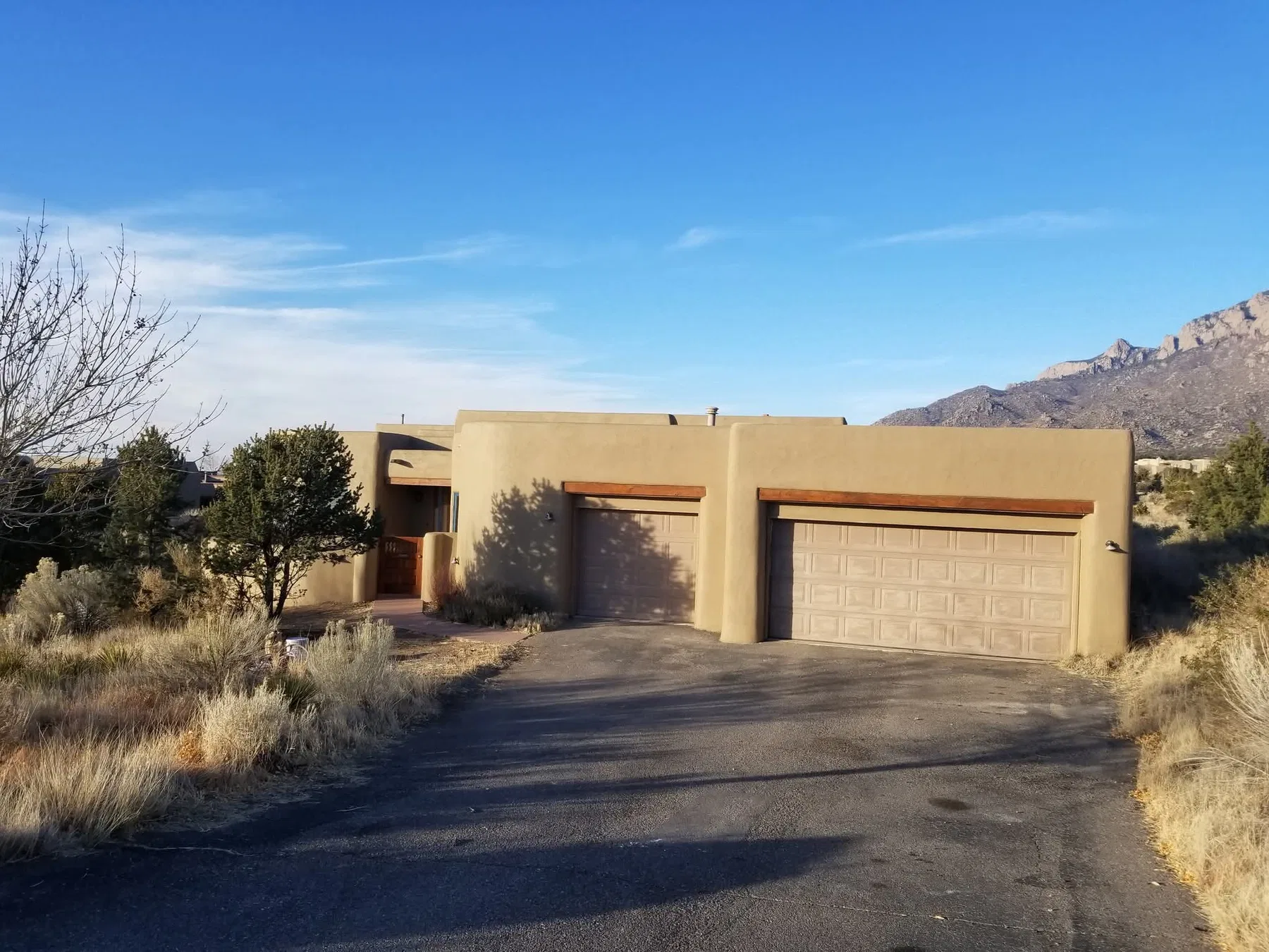 Exterior stucco patch and repaint