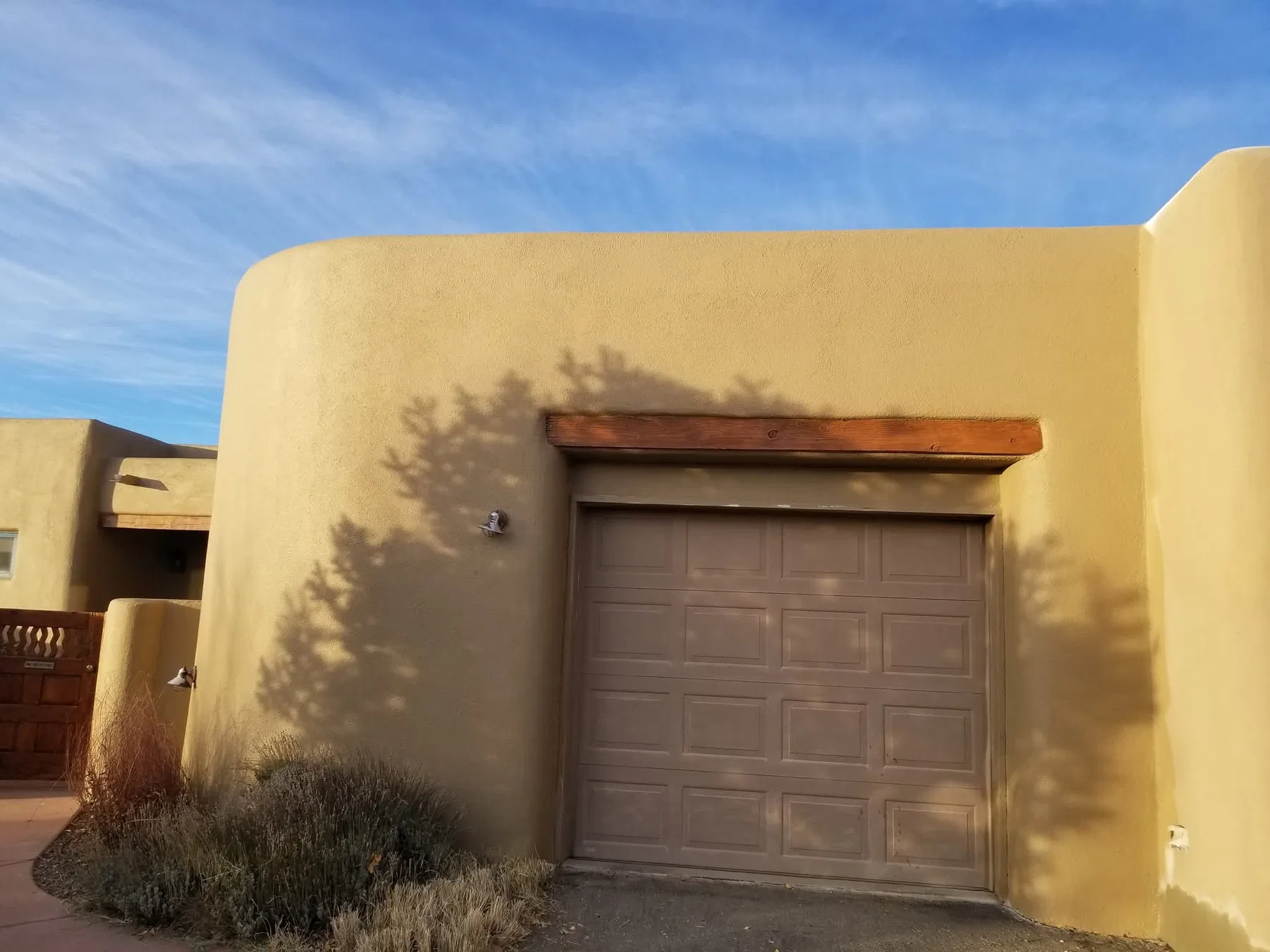 Two-story stucco home exterior refinish