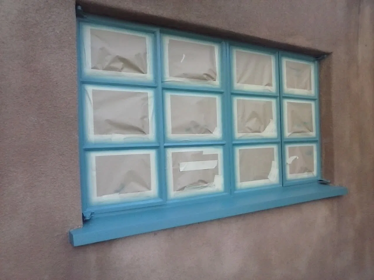 Restored adobe-style stucco exterior