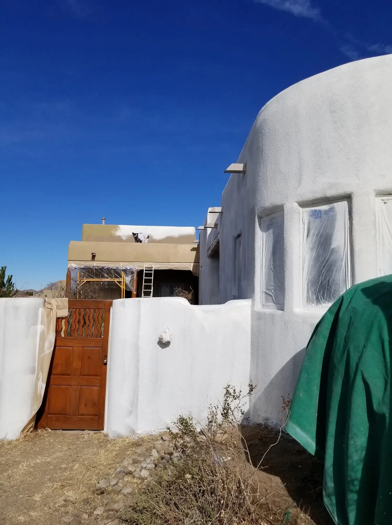 Exterior stucco patch and repaint