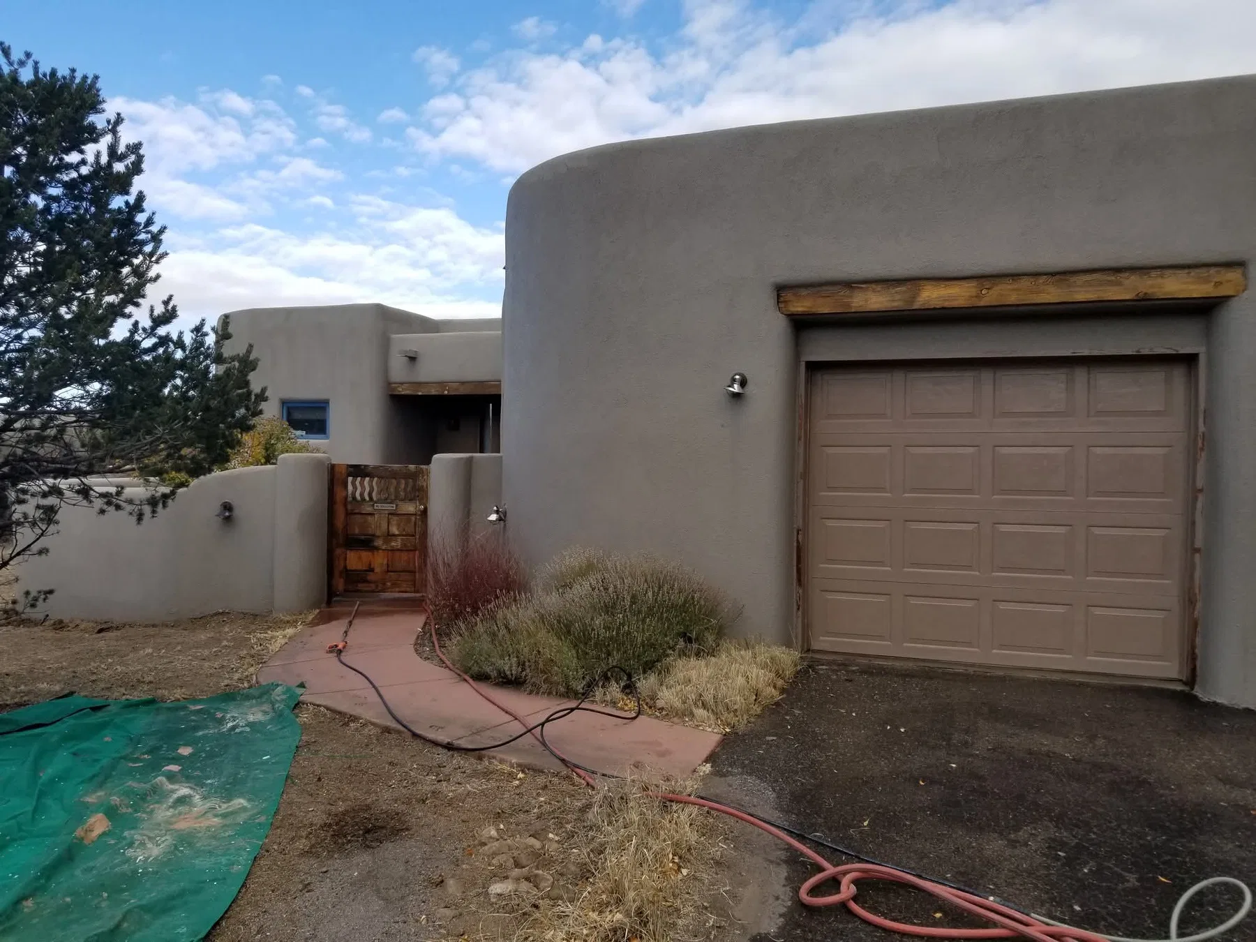 Two-story stucco home exterior refinish
