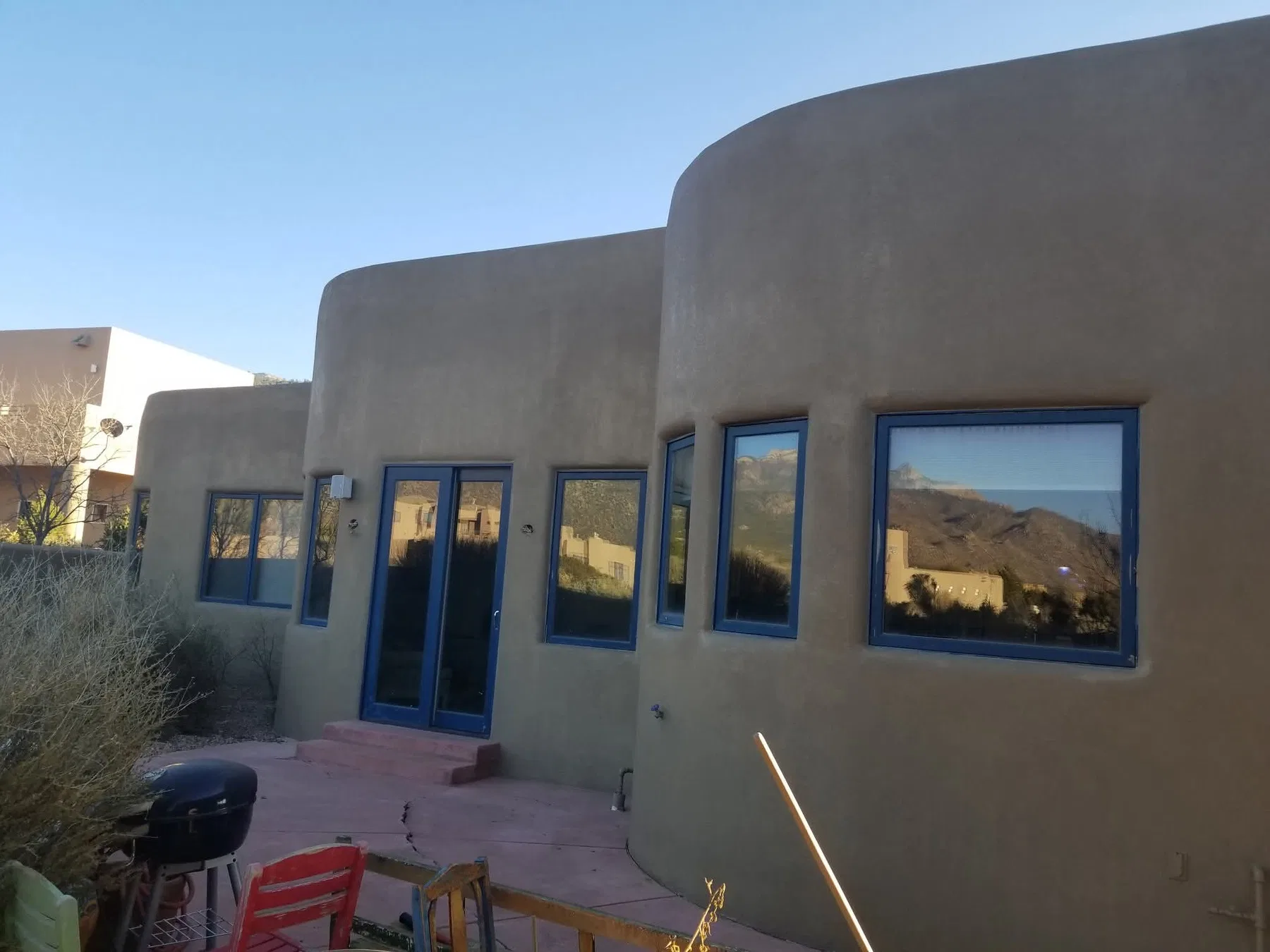 Fresh exterior paint on a Southwest-style home