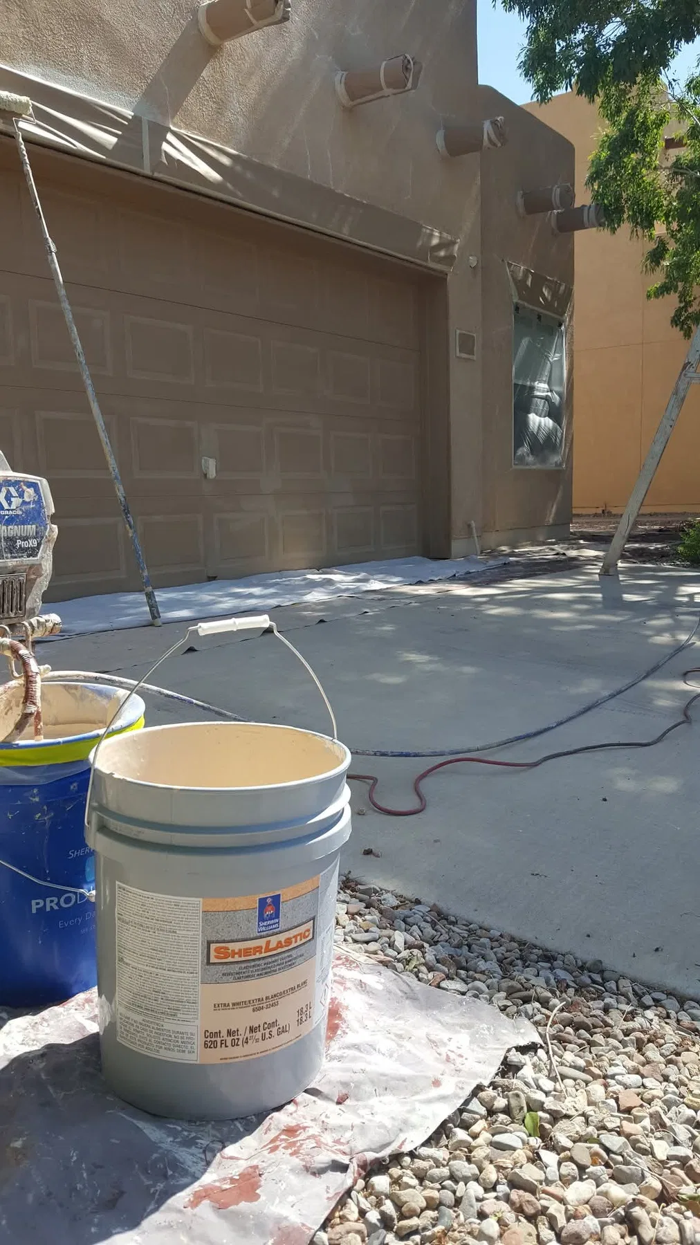 Exterior stucco patch and repaint