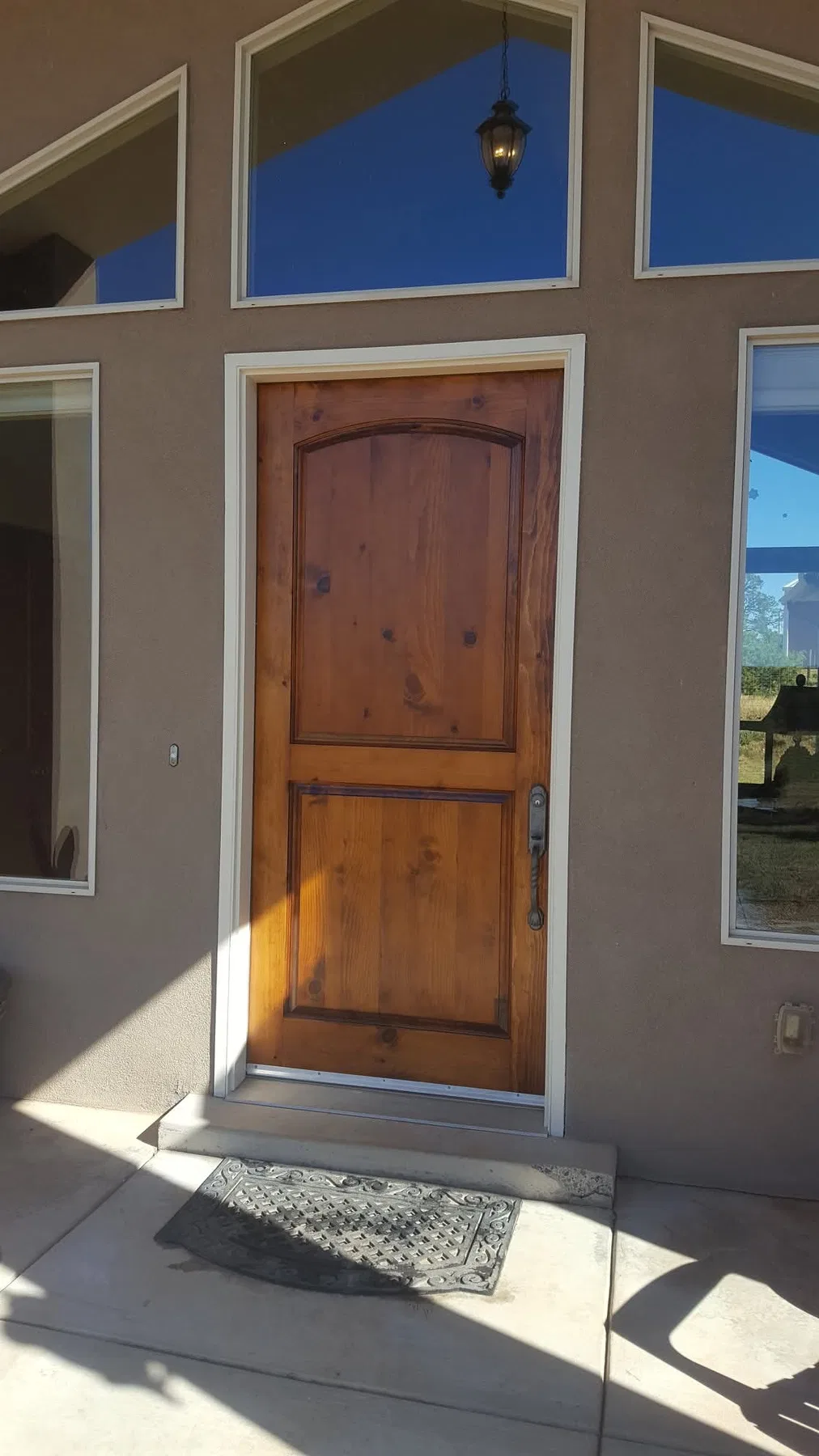 Restored adobe-style stucco exterior