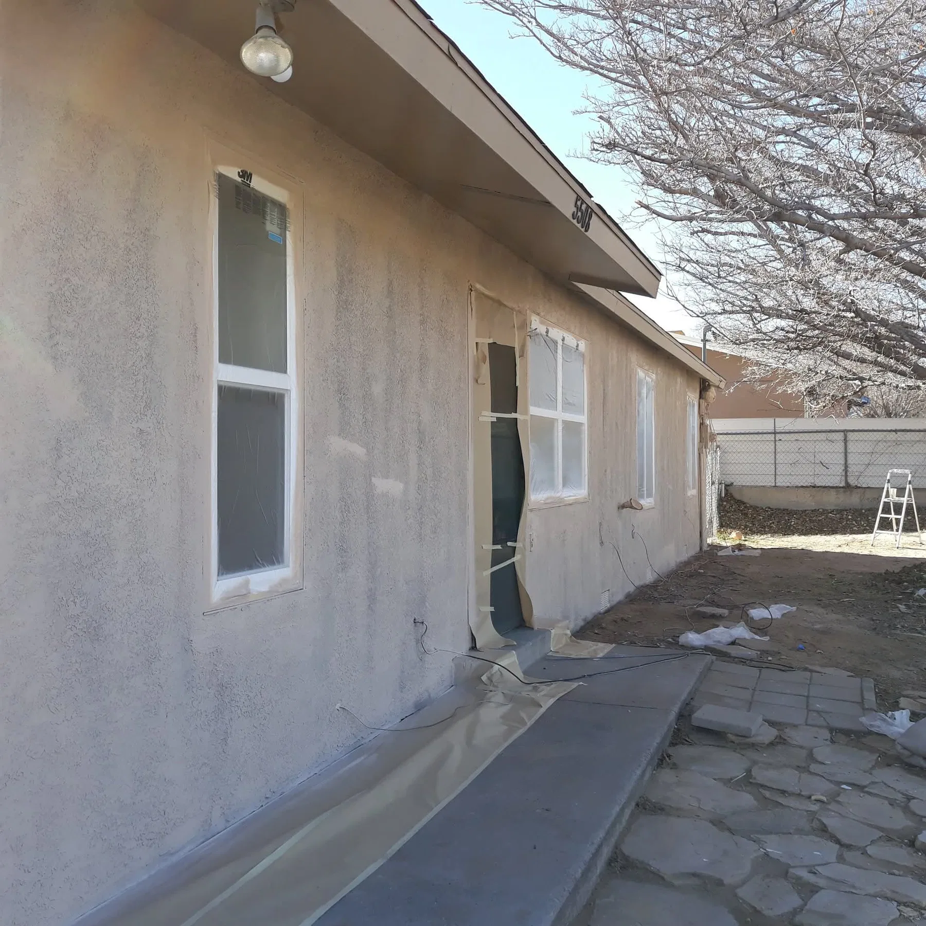 Two-story stucco home exterior refinish