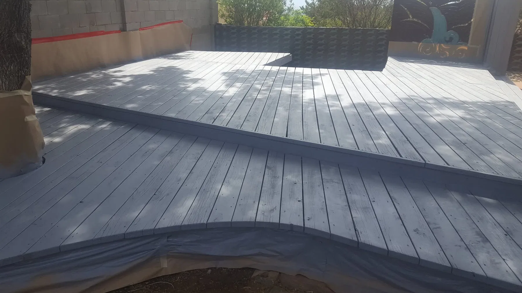 Fresh exterior paint on a Southwest-style home
