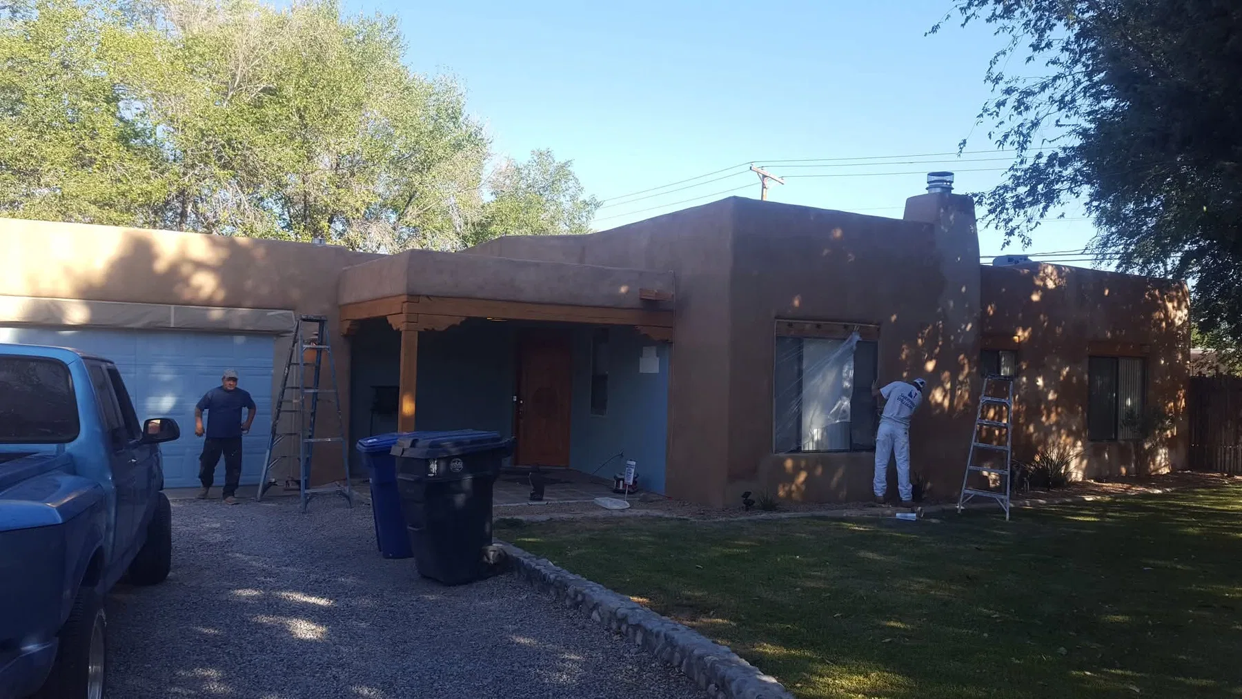 Repaired and repainted stucco exterior on an Albuquerque home
