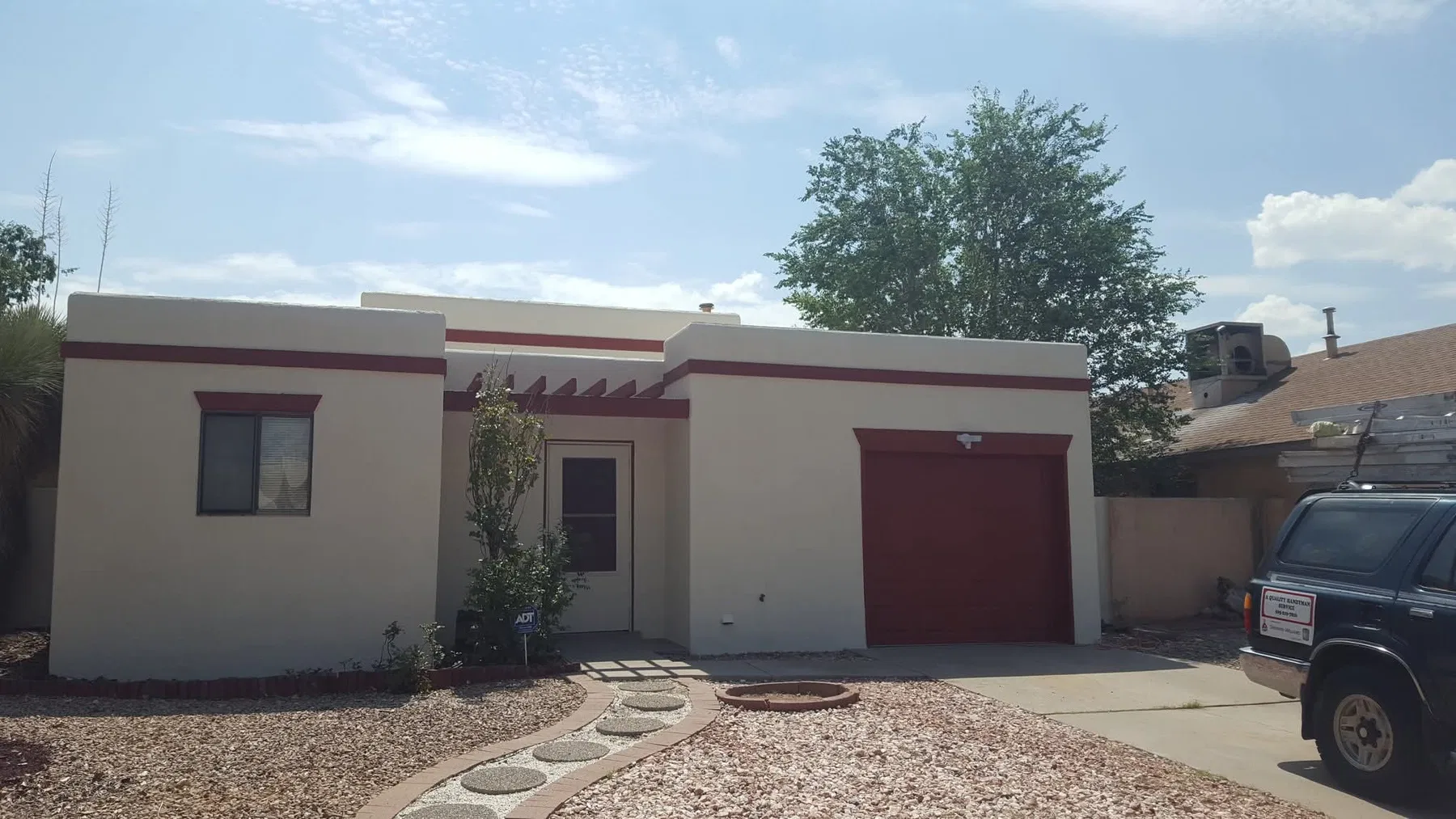 Restored adobe-style stucco exterior