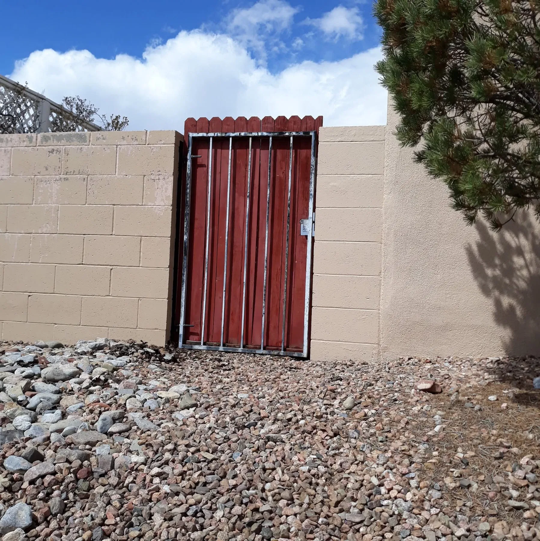 Exterior stucco patch and repaint