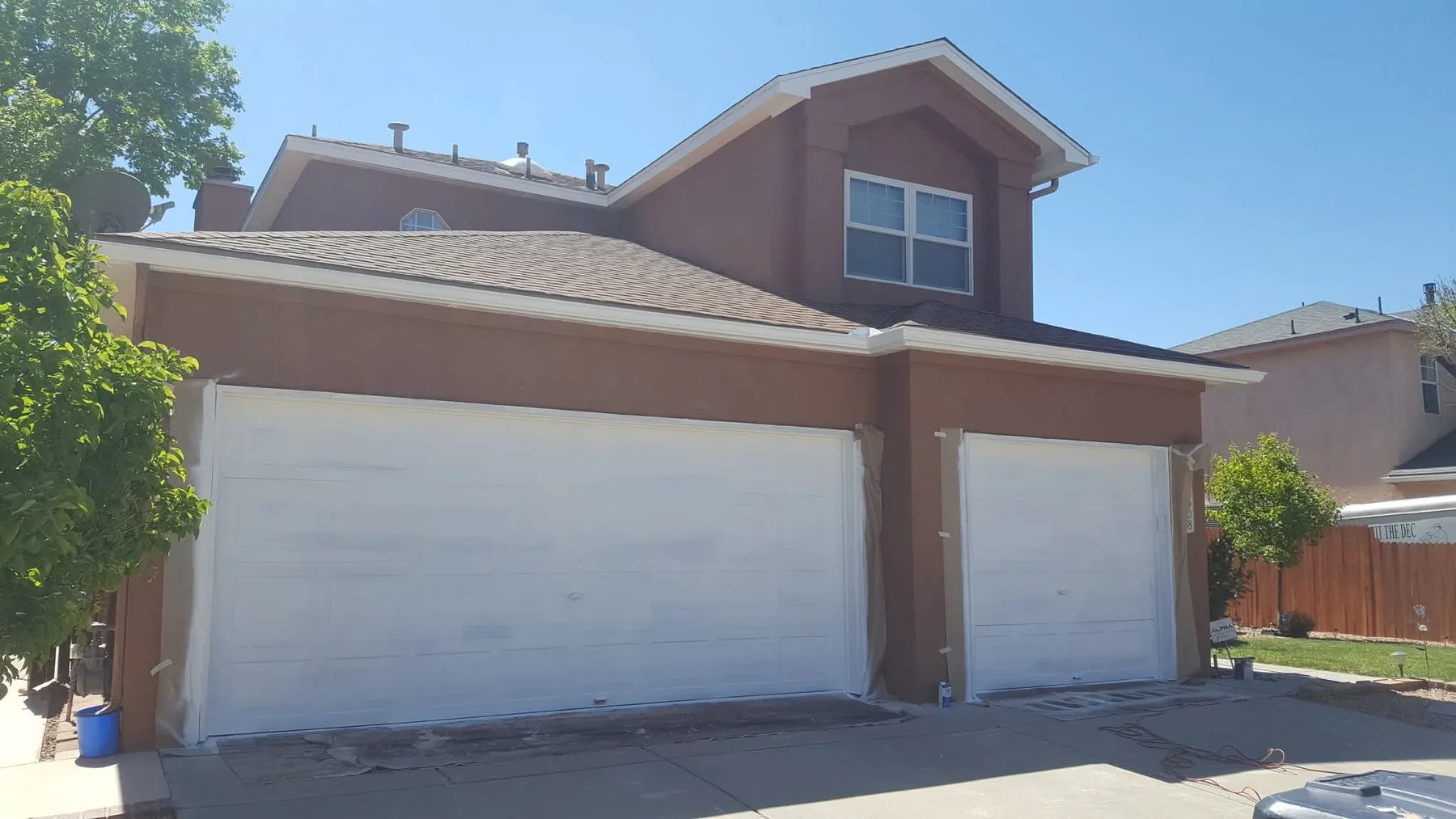 Fresh exterior paint on a Southwest-style home