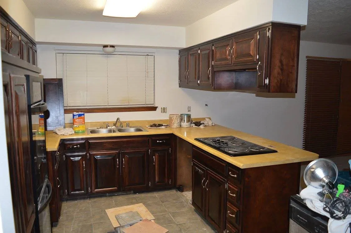 Kitchen remodel with dark wood cabinetry